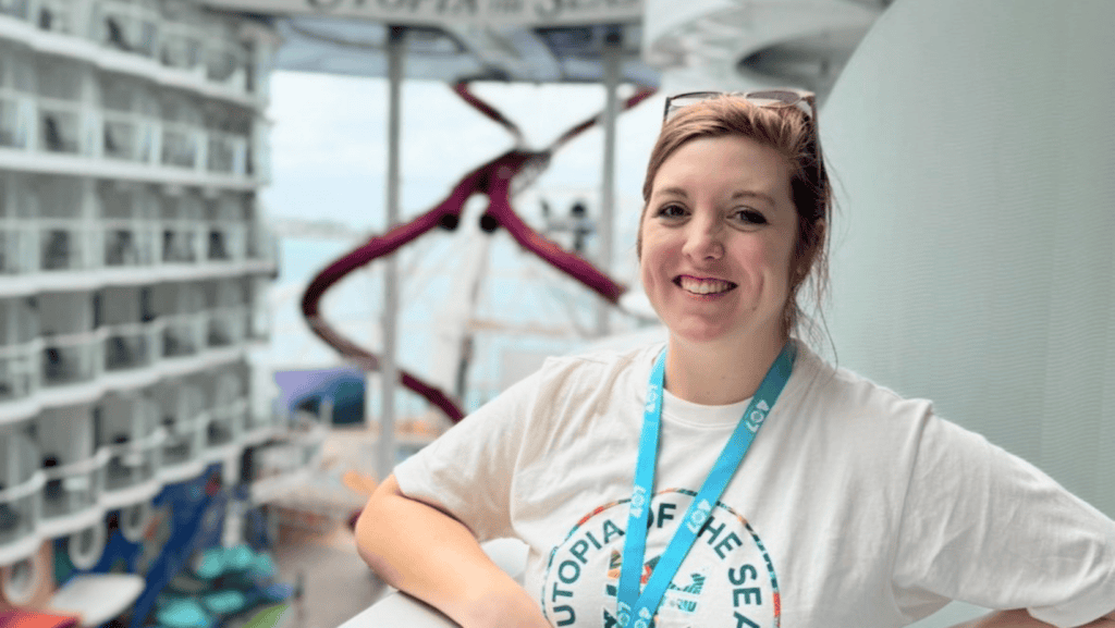 Libby Garcia smiling at 407&Beyond with a boat deck background.